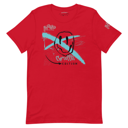 Maglietta rossa vivace con stampa ispirata ai graffiti: un volto sorridente stilizzato con un dinamico tocco blu chiaro a "X" e la scritta "Graffiti Edition". Perfetta per look audaci, moda street e abbigliamento casual. Parole chiave: t-shirt, maglietta rossa, graffiti, street style, moda giovanile, abbigliamento urban, design unico, stampa artistica, casual, streetwear Italia, tendenze moda.